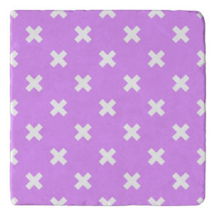 White cross stitches on lilac trivet