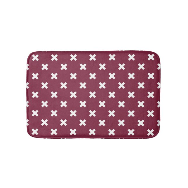 White cross stitches on mulberry bath mat (Front)