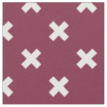White cross stitches on mulberry fabric