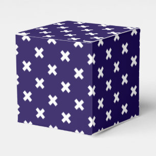 White cross stitches on navy blue favor boxes