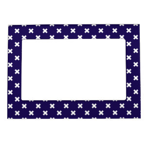 White cross stitches on navy blue magnetic frame