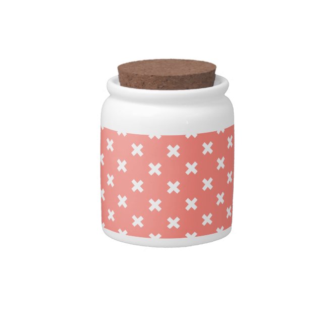 White cross stitches on peach candy jar (Front)