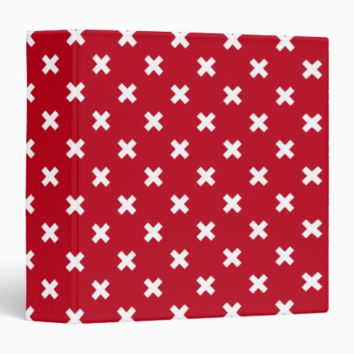 White cross stitches on red 3 ring binder