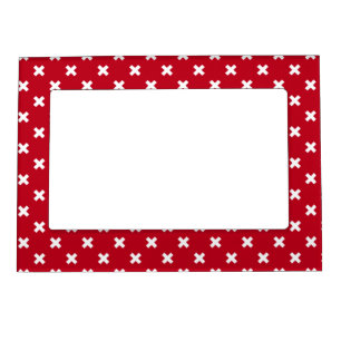 White cross stitches on red magnetic frame