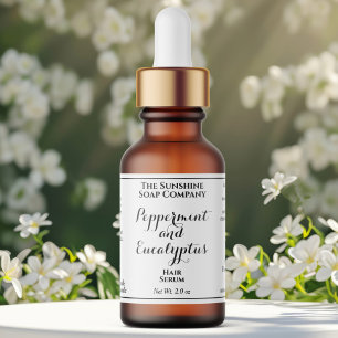 White curly text cosmetics dropper bottle label