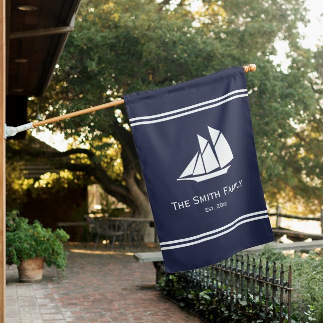 White Custom Text and Sailboat on Midnight Blue House Flag (In SItu)