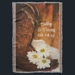 White Daisies Cowboy Boots Country Western Wedding Throw Blanket<br><div class="desc">Personalize the charming White Daisies and Cowboy Boots Country Western Wedding Throw with the names of the bride and groom and marriage ceremony date to create a keepsake gift for an engagement party, bridal shower or marriage. This cozy custom ranch style nuptial blanket features a quaint digitally enhanced floral photograph...</div>