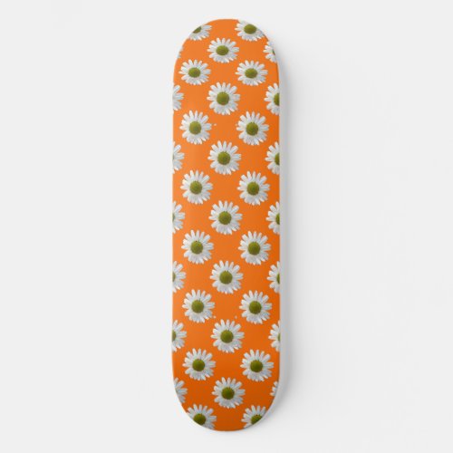 White daisies on orange skateboard deck