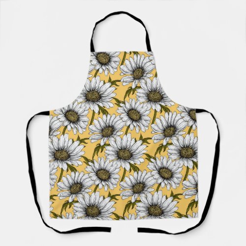 White daisies wild flowers on yellow apron