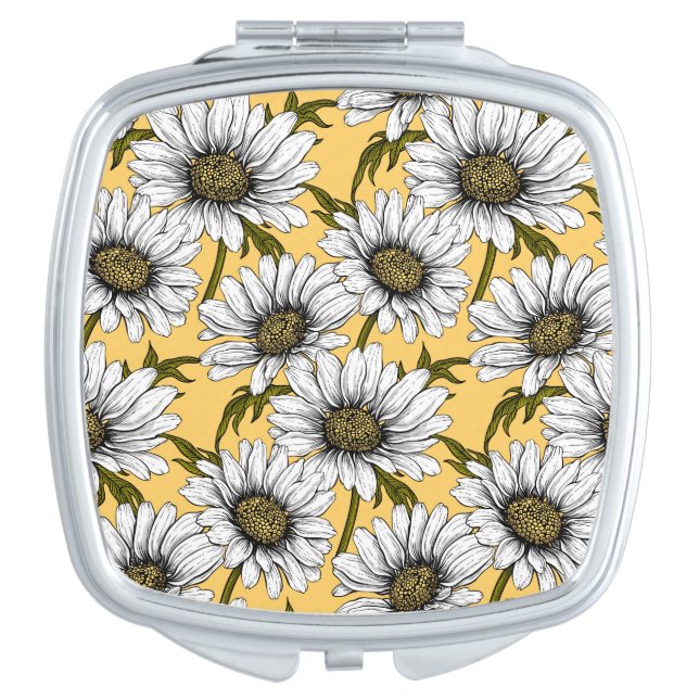 White daisies, wild flowers on yellow compact mirror (Front)