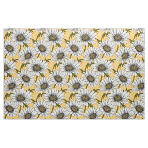 White daisies, wild flowers on yellow fabric