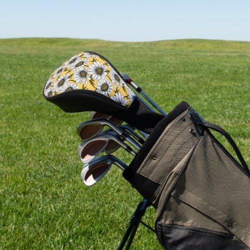 White daisies wild flowers on yellow golf head cover