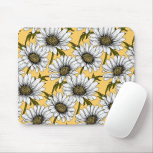 White daisies, wild flowers on yellow mouse pad