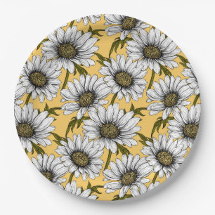 White daisies, wild flowers on yellow paper plates