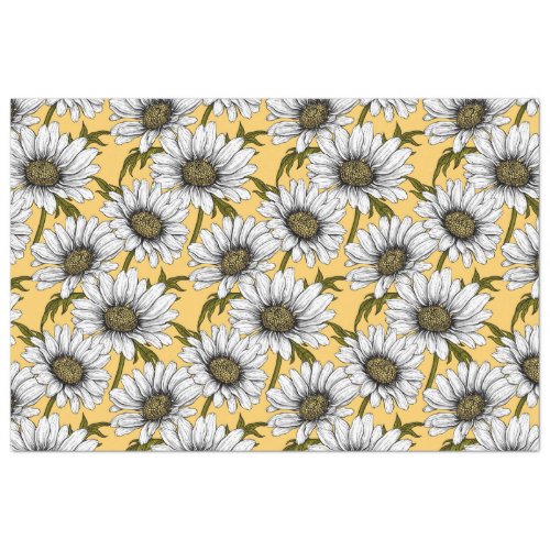 White daisies wild flowers on yellow tissue paper