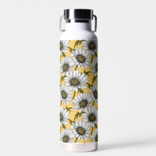 White daisies, wild flowers on yellow water bottle
