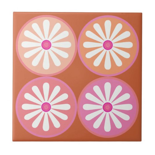 White daisies with pink circles on moderate orange ceramic tile