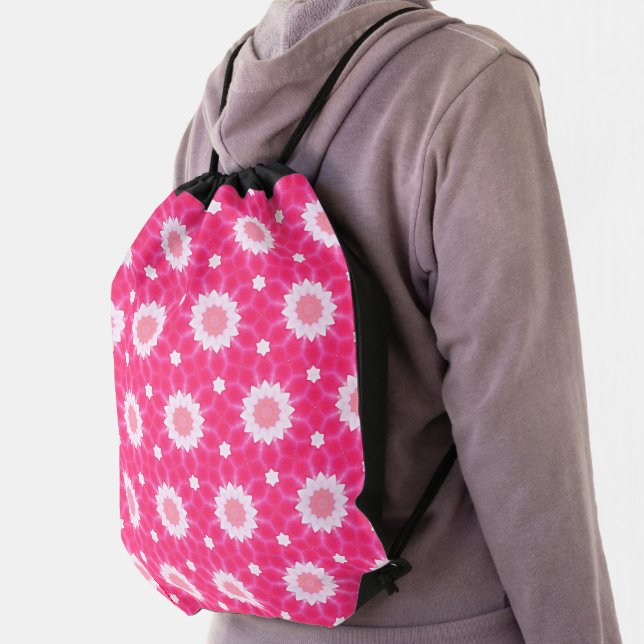 White daisy and stars over pink background pattern drawstring bag (Insitu)