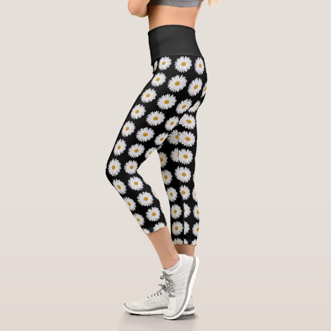 White Daisy Floral Pattern on Black Capri Leggings (Left)