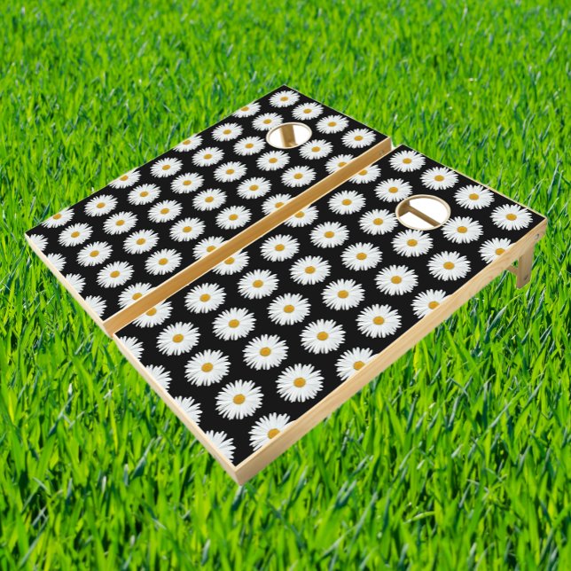 White Daisy Floral Pattern on Black Cornhole Set (In Situ)