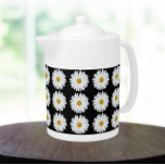 White Daisy Floral Pattern on Black Teapot<br><div class="desc">White ceramic teapot with lid that features the photo image of a pretty,  white Daisy flower on a black background and printed in a repeating pattern. A lovely,  floral design!</div>
