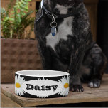 White Daisy Floral Pattern Personalized Pet Bowl<br><div class="desc">Ceramic pet food bowl for your cat or dog that features the photo image of a white Daisy flower with yellow center against a black background and printed in a repeating pattern along with your pet's name. Personalize your pet bowl by replacing name with your own pet's name. Customize further...</div>