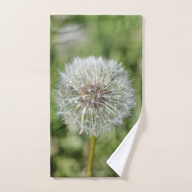 White dandelion flower on green grass hand towel  (Hand Towel)