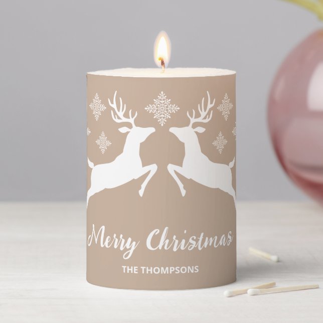White Deer Shapes On Beige With Snowflakes & Text Pillar Candle (In Situ)