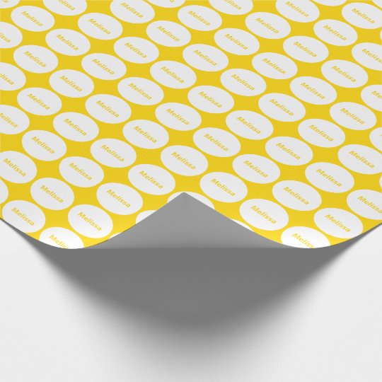 white dots on golden yellow wrapping paper