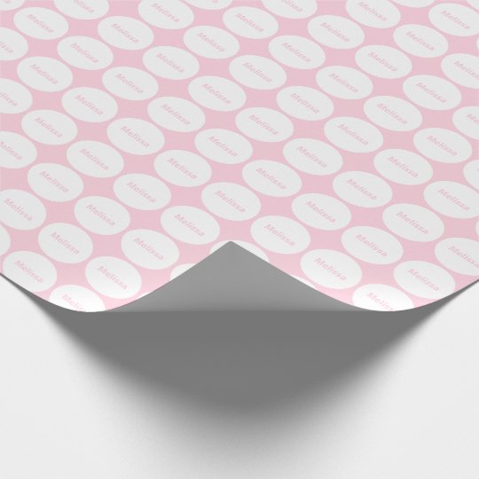 white dots on light pink wrapping paper