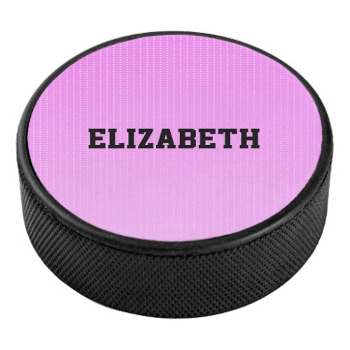 White dots pink pattern hockey puck