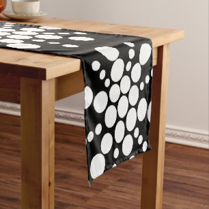 White dotted stars on black short table runner