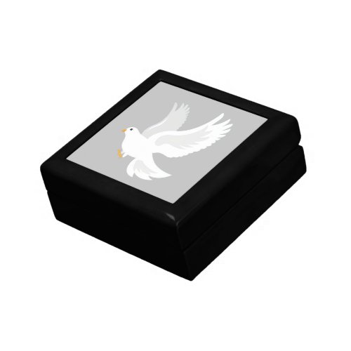 White dove bird on grey gift box