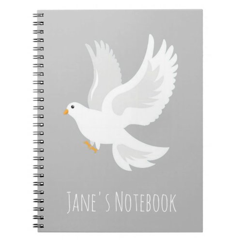 White dove bird on grey notebook