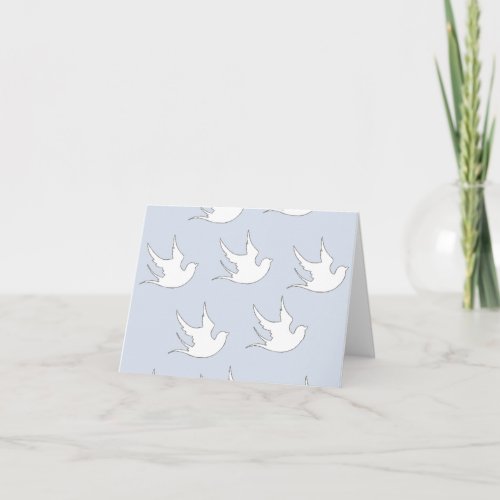 white doves on blue card