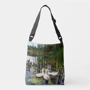 White ducks, lily pads, cattails, lake shore crossbody bag