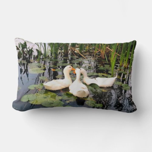 White ducks lily pads cattails lake shore lumbar pillow