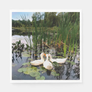 White ducks, lily pads, cattails, lake shore napkins