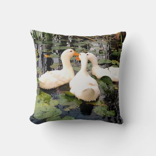 White ducks lily pads cattails lake shore throw pillow