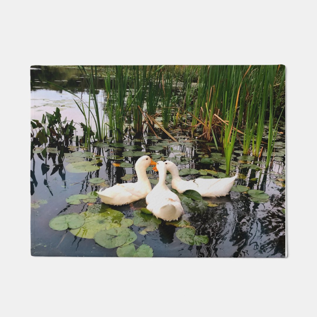 White dusks, cattails, lily pads, lakeshore design doormat Zazzle