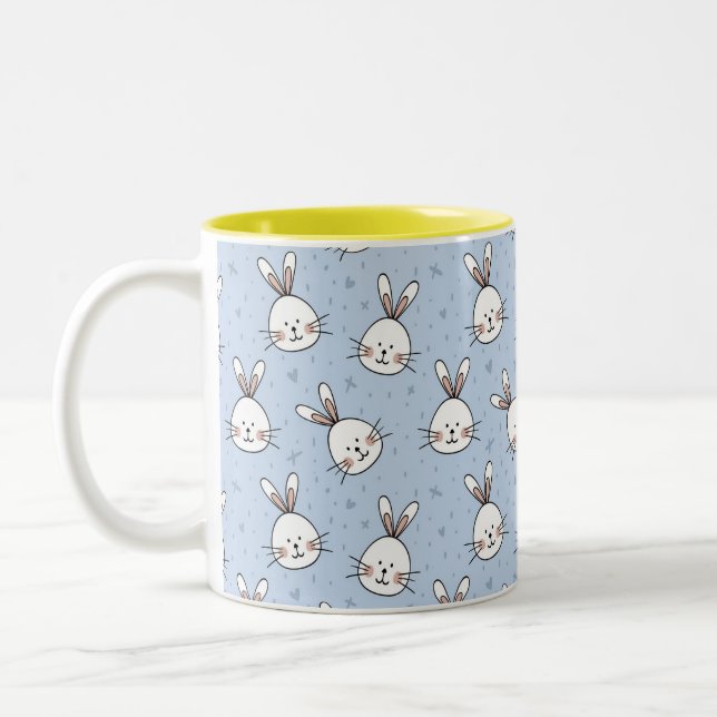 White Easter Bunnies on Light Blue Two-Tone Coffee Mug (Left)