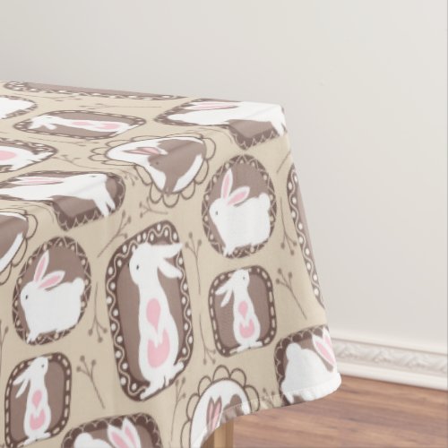 White Easter Bunnies On Tan and Brown Tablecloth