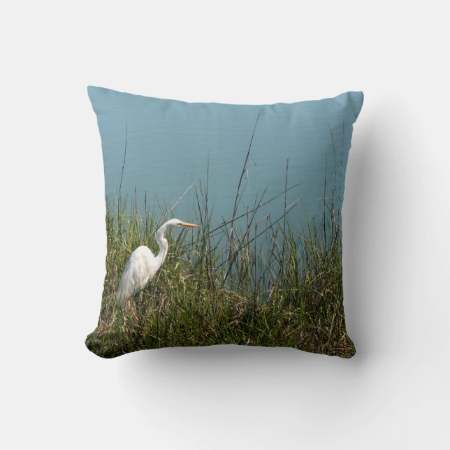 White egret standing in grass w water throw pillow (Front)