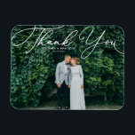 White Elegant Handwritten Script Photo Wedding Magnet<br><div class="desc">Celebrate your love and show gratitude with our customizable photo wedding thank you magnet! This unique keepsake is perfect for reminding your loved ones of your special day while expressing your heartfelt thanks in a memorable way. It features an elegant white script. Personalize by adding your photo and details. This...</div>