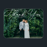 White Elegant Handwritten Script Photo Wedding Magnet<br><div class="desc">Celebrate your love and show gratitude with our customizable photo wedding thank you magnet! This unique keepsake is perfect for reminding your loved ones of your special day while expressing your heartfelt thanks in a memorable way. It features an elegant white script. Personalize by adding your photo and details. This...</div>