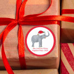 White Elephant Party Personalized Christmas Gift Classic Round Sticker<br><div class="desc">Cute holiday animals are my favorite part of Christmas. A beautiful elephant wearing a red Santa hat and looking happy. This fills me with the Christmas spirit. Perfect gift wrap stickers for a white elephant party.</div>