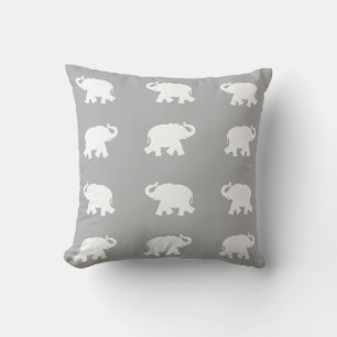 White elephant pattern on light gray throw pillow