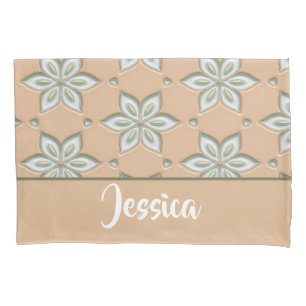 White engraved flowers on tan pillow case