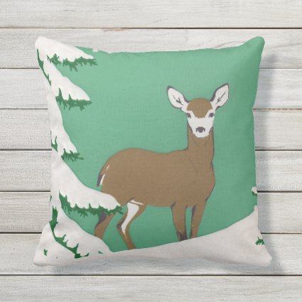 White Faced Brown Deer in snow by Pine Tree Outdoor Pillow