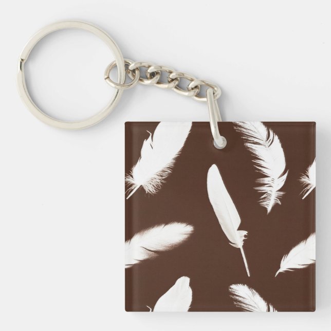 White feather print on chocolate brown keychain (Front)